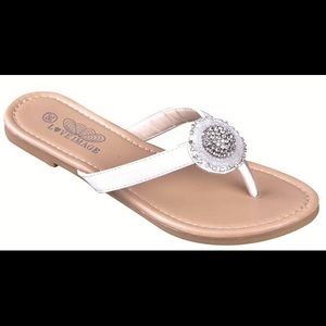 Beaded detail flip flop sandals in white.